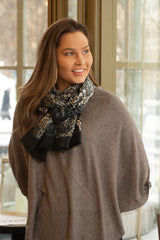 Closeup image of model wearing Juolas Poncho in color nutria